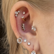 Cluster z 4 dużymi kryształami w szponach bez obicia - idealny do concha tytanowy ozdobny labret złoty kompozycja piercing ucha zagięty kolczyk korona